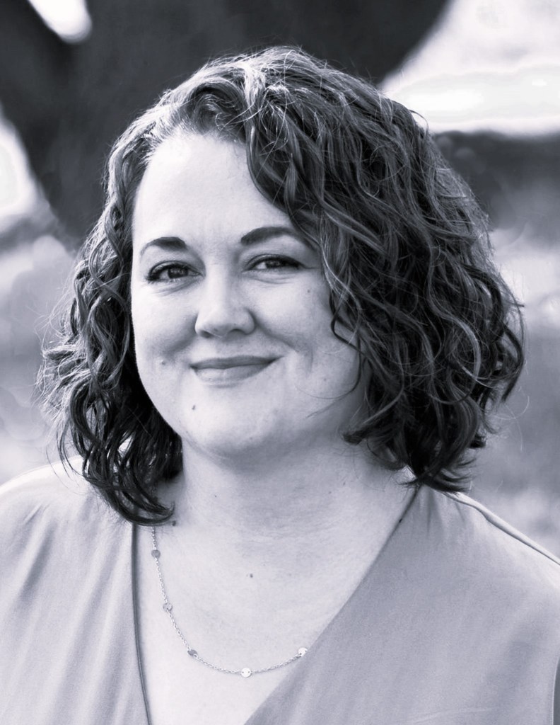 Image of Shawnee Randolph, author of The Author and The Illustrator.
Shawnee has short dark wavy hair and dark eyes. The picture is in black and white.